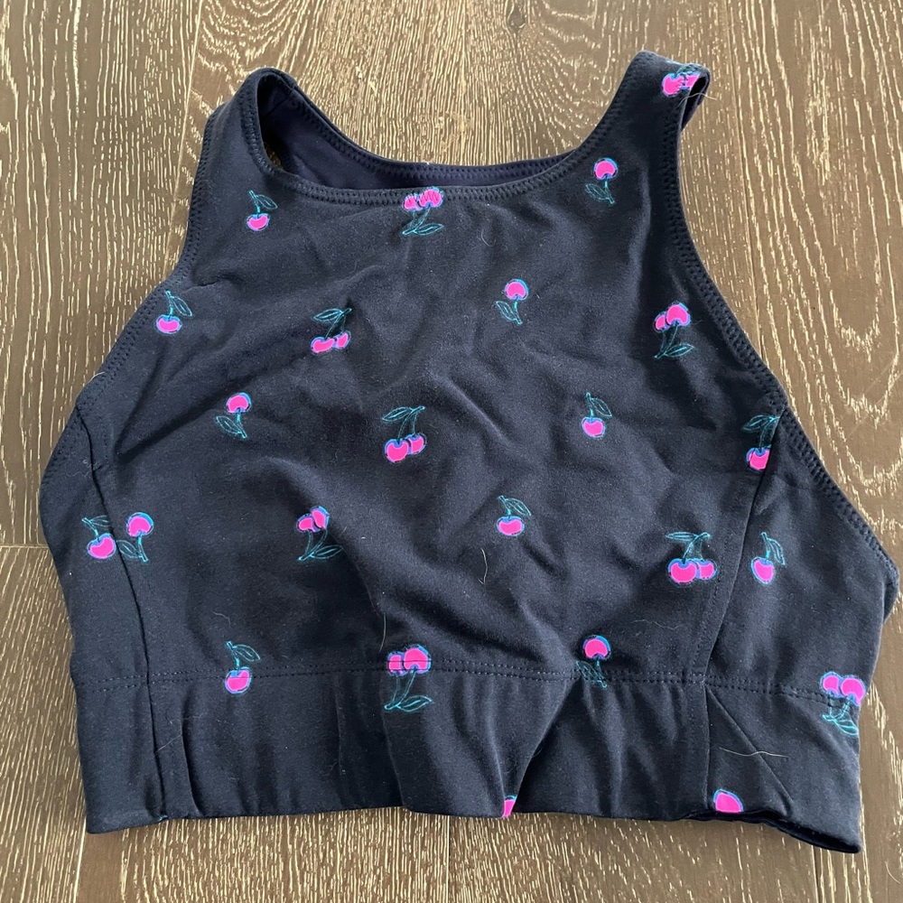 New Balance navy blue sports bra with cherry print. Never worn